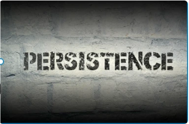 Word Persistence painted on a wall symbolizing determination